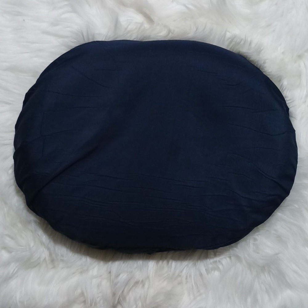 Wheelchair cushion, blue in color, donut hole,